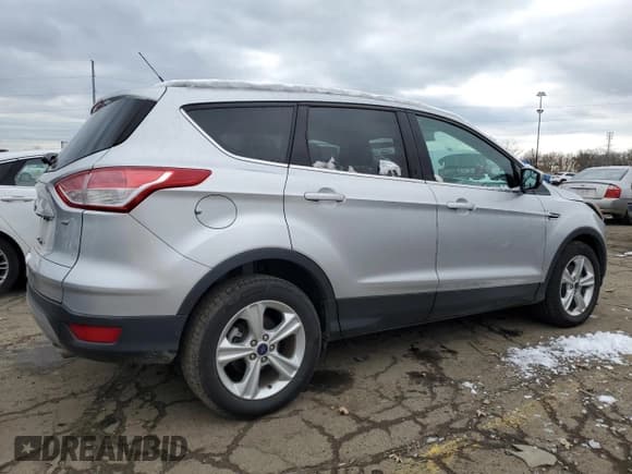 ✅ 2015 Ford Escape SE • VIN: 1FMCU0G76FUB71465 • Lot: 91643735. Listed on Copart with 66,860 mi. Free auction sales archive from the USA and detailed vehicle history report at DreamBid. Image 3.