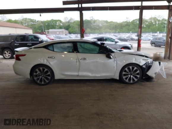 ✅ 2016 Nissan Maxima S • VIN: 1N4AA6AP6GC386325 • Lot: 42376260. Listed on IAAI with 108,000 mi. Free auction sales archive from the USA and detailed vehicle history report at DreamBid. Image 12.