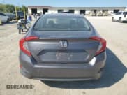 ✅ 2016 Honda Civic LX • VIN: 19XFC2F52GE020171 • Лот: 72046965. Опубликован ранее на Copart с пробегом 109 883 миль. Бесплатный доступ к архиву аукционных продаж из США и подробный отчёт об истории автомобиля на DreamBid. Изображение 6.