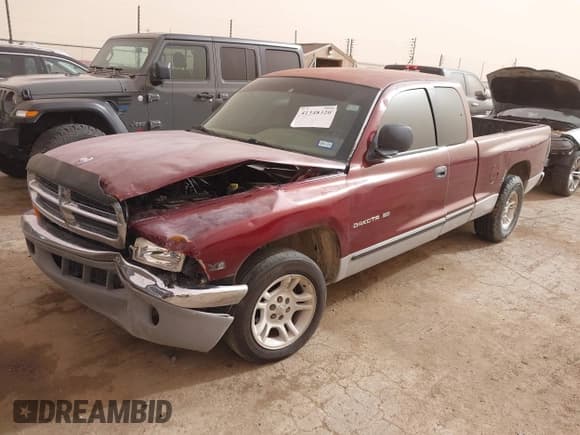 ✅ 2000 Dodge Dakota • VIN: 1B7GL22X2YS642070 • Lot: 41348320. Listed on IAAI with Not provided. Free auction sales archive from the USA and detailed vehicle history report at DreamBid. Image 2.