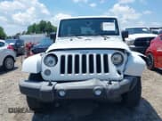 ✅ 2018 Jeep Wrangler Unlimited Sahara • VIN: 1C4BJWEG3JL805263 • Lot: 42593276. Listed on IAAI with 96,489 mi. Free auction sales archive from the USA and detailed vehicle history report at DreamBid. Image 12.