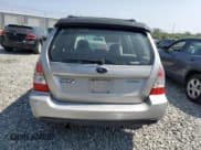 ✅ 2006 Subaru Forester X • VIN: JF1SG636X6H718713 • Lot: 68069835. Listed on Copart with 154,292 mi. Free auction sales archive from the USA and detailed vehicle history report at DreamBid. Image 6.