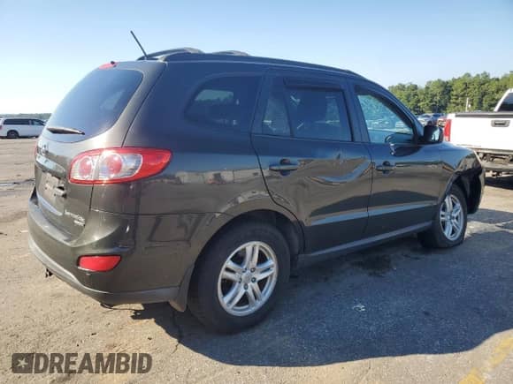 2010 Hyundai Santa Fe GLS с VIN 5NMSGDAB4AH411639, выставлен на аукционе Copart как лот 74594084 с пробегом 104 258 миль миль и Списание • Salvage title. История ставок и продаж доступна на DreamBid. Изображение 3.