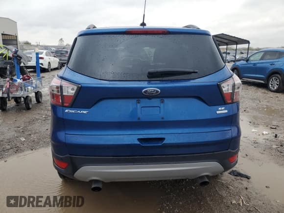 ✅ 2017 Ford Escape SE • VIN: 1FMCU0GD6HUA91575 • Lot: 90646755. Wystawiony na Copart z przebiegiem 91 268 mil. Bezpłatny archiwum sprzedaży aukcyjnych z USA i szczegółowy raport historii pojazdu na DreamBid. Zdjęcie 6.