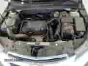 2015 Chevrolet Cruze LT z VIN 1G1PC5SB1F7130928, wystawiony jako Copart lot #84561045 z przebiegiem 106 370 mil mil oraz Szkoda całkowita • Salvage title. Historia ofert i sprzedaży dostępna na DreamBid. Obrazek 11.