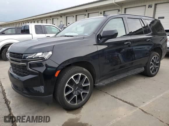 2021 Chevrolet Tahoe RST with VIN 1GNSKRKT5MR456664, listed as a Copart auction lot 57946865 with 56,963 mi miles and Salvage title. Bid and sale history available at DreamBid. Image 1.