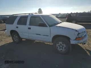 2003 Chevrolet Blazer LS with VIN 1GNDT13X03K120212, listed as a Copart auction lot 41814425 with 154,757 mi miles and Salvage title. Bid and sale history available at DreamBid. Image 4.