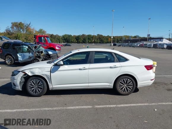 ✅ 2021 Volkswagen Jetta S • VIN: 3VWC57BU6MM015156 • Lot: 43407215. Listed on IAAI with 130,320 mi. Free auction sales archive from the USA and detailed vehicle history report at DreamBid. Image 14.