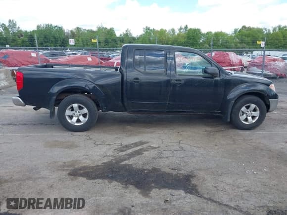 ✅ 2009 Nissan Frontier SE • VIN: 1N6AD09W39C426497 • Lot: 42204837. Listed on IAAI with 79,049 mi. Free auction sales archive from the USA and detailed vehicle history report at DreamBid. Image 13.