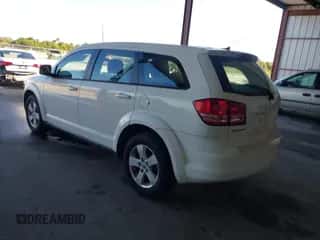 2013 Dodge Journey American Value с VIN 3C4PDCAB5DT517839, выставлен на аукционе IAAI как лот 43561936 с пробегом 183 430 миль миль и . История ставок и продаж доступна на DreamBid. Изображение 3.