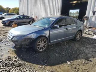 ✅ 2012 Ford Fusion SEL • VIN: 3FAHP0JG3CR101909 • Lot: 86105795. Wystawiony na Copart z przebiegiem 182 145 mil. Bezpłatny archiwum sprzedaży aukcyjnych z USA i szczegółowy raport historii pojazdu na DreamBid. Zdjęcie 1.