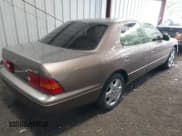 ✅ 2000 Lexus LS 400 • VIN: JT8BH28F4Y0169874 • Lot: 42909129. Listed on IAAI with 272,624 mi. Free auction sales archive from the USA and detailed vehicle history report at DreamBid. Image 4.