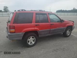 ✅ 1998 Jeep Grand Cherokee Laredo • VIN: 1J4FX58S3WC144684 • Лот: 67226694. Опубликован ранее на Copart с пробегом 106 602 миль. Бесплатный доступ к архиву аукционных продаж из США и подробный отчёт об истории автомобиля на DreamBid. Изображение 3.