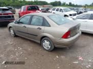 ✅ 2003 Ford Focus LX • VIN: 1FAFP33PX3W167800 • Lot: 42937412. Listed on IAAI with 112,556 mi. Free auction sales archive from the USA and detailed vehicle history report at DreamBid. Image 3.