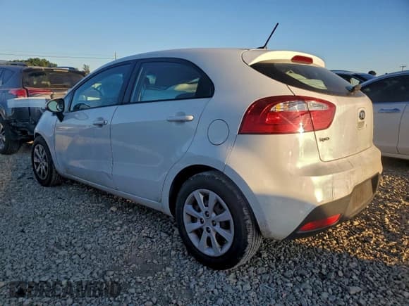 ✅ 2014 Kia Rio LX • VIN: KNADM5A30E6418281 • Lot: 96533555. Wystawiony na Copart z przebiegiem 186 957 mil. Bezpłatny archiwum sprzedaży aukcyjnych z USA i szczegółowy raport historii pojazdu na DreamBid. Zdjęcie 2.