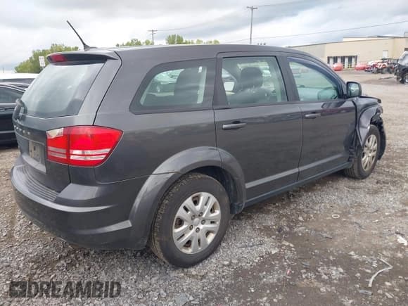 ✅ 2014 Dodge Journey SE • VIN: 3C4PDCAB6ET244461 • Lot: 43296582. Listed on IAAI with 156,511 mi. Free auction sales archive from the USA and detailed vehicle history report at DreamBid. Image 4.
