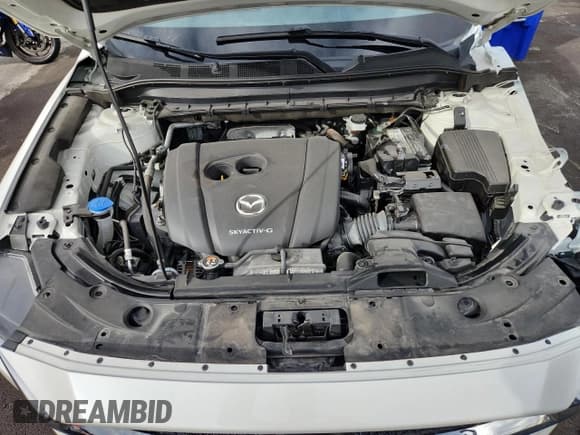 ✅ 2020 Mazda CX-5 Grand Touring • VIN: JM3KFADM2L0825253 • Lot: 86153335. Listed on Copart with 55,428 mi. Free auction sales archive from the USA and detailed vehicle history report at DreamBid. Image 12.