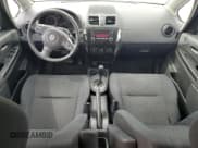 ✅ 2013 Suzuki SX4 LE • VIN: JS2YC5A35D6101897 • Лот: 62202315. Опубликован ранее на Copart с пробегом 120 532 миль. Бесплатный доступ к архиву аукционных продаж из США и подробный отчёт об истории автомобиля на DreamBid. Изображение 8.