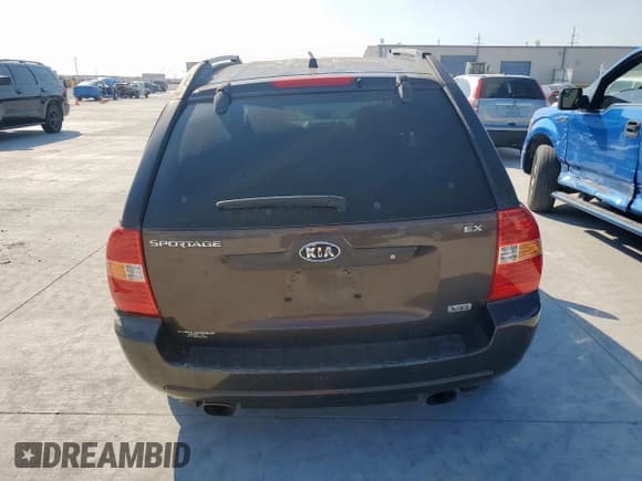 ✅ 2006 Kia Sportage LX • VIN: KNDJF723167163274 • Лот: 81846425. Опубликован ранее на Copart с пробегом 241 774 миль. Бесплатный доступ к архиву аукционных продаж из США и подробный отчёт об истории автомобиля на DreamBid. Изображение 6.