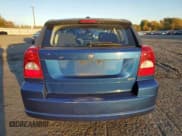 ✅ 2009 Dodge Caliber SXT • VIN: 1B3HB48AX9D197736 • Лот: 79969934. Опубликован ранее на Copart с пробегом Не указан. Бесплатный доступ к архиву аукционных продаж из США и подробный отчёт об истории автомобиля на DreamBid. Изображение 6.