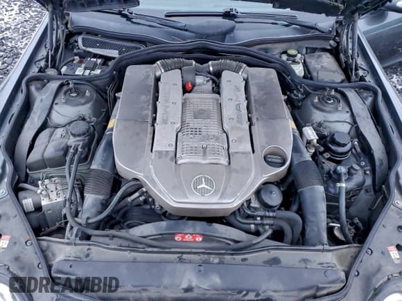 ✅ 2004 Mercedes-Benz SL 55/63 AMG • VIN: WDBSK74F24F065394 • Лот: 94816755. Опубликован ранее на Copart с пробегом Не указан. Бесплатный доступ к архиву аукционных продаж из США и подробный отчёт об истории автомобиля на DreamBid. Изображение 11.