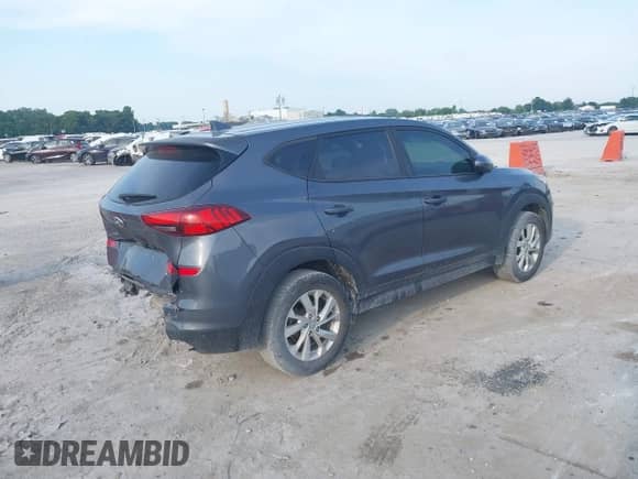 2019 Hyundai Tucson SE with VIN KM8J23A40KU009435, listed as a IAAI auction lot 42847449 with 94,053 mi miles and . Bid and sale history available at DreamBid. Image 4.