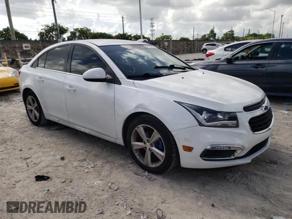 ✅ 2015 Chevrolet Cruze LT • VIN: 1G1PE5SB5F7295164 • Lot: 64239113. Listed on Copart with 132,843 mi. Free auction sales archive from the USA and detailed vehicle history report at DreamBid. Image 4.
