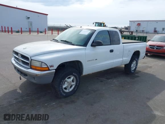 ✅ 1998 Dodge Dakota SLT • VIN: 1B7GG22X8WS677553 • Lot: 41854961. Wystawiony na IAAI z przebiegiem 167 917 mil. Bezpłatny archiwum sprzedaży aukcyjnych z USA i szczegółowy raport historii pojazdu na DreamBid. Zdjęcie 2.