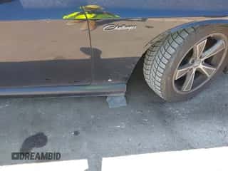 2009 Dodge Challenger R/T z VIN 2B3LJ54T09H558338, wystawiony jako IAAI lot #43076962 z przebiegiem 165 430 mil mil oraz . Historia ofert i sprzedaży dostępna na DreamBid. Obrazek 6.