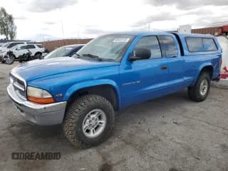 ✅ 1999 Dodge Dakota SLT • VIN: 1B7GG22Y7XS166815 • Lot: 48402125. Wystawiony na Copart z przebiegiem 176 458 mil. Bezpłatny archiwum sprzedaży aukcyjnych z USA i szczegółowy raport historii pojazdu na DreamBid. Zdjęcie 1.