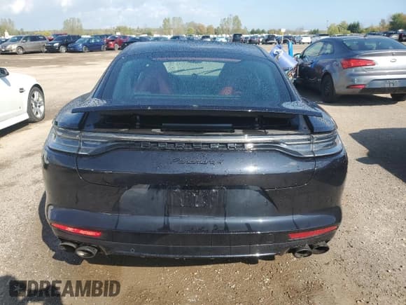 ✅ 2022 Porsche Panamera • VIN: WP0AJ2A76NL102076 • Лот: 82116445. Опубликован ранее на Copart с пробегом 76 712 миль. Бесплатный доступ к архиву аукционных продаж из США и подробный отчёт об истории автомобиля на DreamBid. Изображение 6.