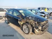 ✅ 2016 Ford Focus Titanium • VIN: 1FADP3N23GL339780 • Lot: 43192984. Listed on IAAI with 136,068 mi. Free auction sales archive from the USA and detailed vehicle history report at DreamBid. Image 1.