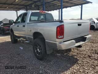 2002 Dodge 1500 z VIN 1D7HU18Z22J255249, wystawiony jako Copart lot #64600114 z przebiegiem 184 743 mil mil oraz Szkoda całkowita • Salvage title. Historia ofert i sprzedaży dostępna na DreamBid. Obrazek 2.