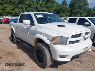 ✅ 2012 Ram 1500 Sport • VIN: 1C6RD7MT0CS190018 • Lot: 42631890. Listed on IAAI with 112,071 mi. Free auction sales archive from the USA and detailed vehicle history report at DreamBid. Image 1.