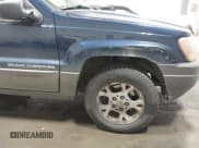 ✅ 1999 Jeep Grand Cherokee Laredo • VIN: 1J4GW58S1XC779363 • Лот: 42492609. Опубликован ранее на IAAI с пробегом 168 820 миль. Бесплатный доступ к архиву аукционных продаж из США и подробный отчёт об истории автомобиля на DreamBid. Изображение 6.