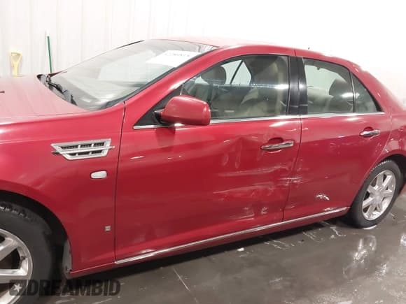 ✅ 2008 Cadillac STS RWD • VIN: 1G6DW67VX80125610 • Лот: 42280815. Опубликован ранее на IAAI с пробегом 207 192 миль. Бесплатный доступ к архиву аукционных продаж из США и подробный отчёт об истории автомобиля на DreamBid. Изображение 6.