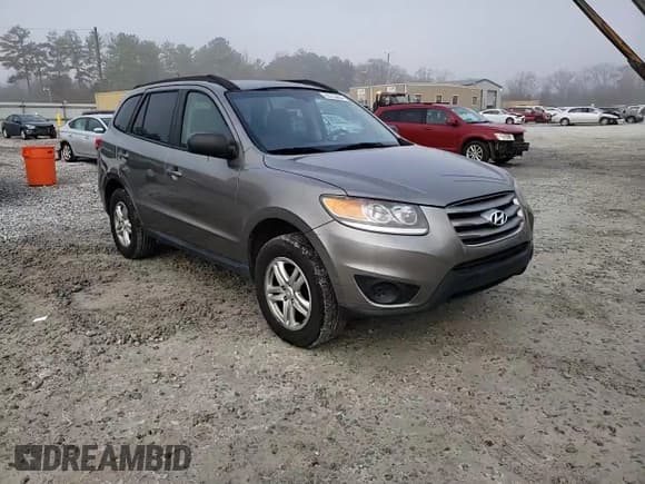 ✅ 2012 Hyundai Santa Fe GLS • VIN: 5XYZG3ABXCG122674 • Lot: 85515604. Listed on Copart with 176,634 mi. Free auction sales archive from the USA and detailed vehicle history report at DreamBid. Image 14.