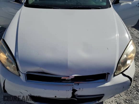 ✅ 2013 Chevrolet Impala LTZ • VIN: 2G1WC5E38D1215761 • Lot: 90534035. Listed on Copart with 205,467 mi. Free auction sales archive from the USA and detailed vehicle history report at DreamBid. Image 11.