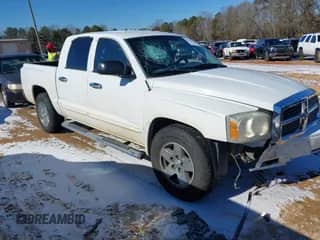 2005 Dodge Dakota Laramie with VIN 1D7HE58N35S138912, listed as a IAAI auction lot 41359470 with 263,136 mi miles and . Bid and sale history available at DreamBid. Image 1.