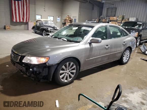 2009 Hyundai Azera GLS с VIN KMHFC46D59A371628, выставлен на аукционе Copart как лот 87460584 с пробегом 103 077 миль миль и Списание • Salvage title. История ставок и продаж доступна на DreamBid. Изображение 1.