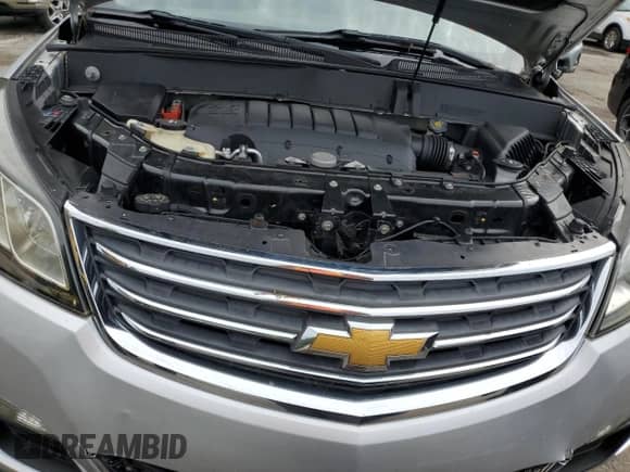 2014 Chevrolet Traverse LT z VIN 1GNKRHKD3EJ175915, wystawiony jako Copart lot #68847145 z przebiegiem 185 805 mil mil oraz Szkoda całkowita • Salvage title. Historia ofert i sprzedaży dostępna na DreamBid. Obrazek 11.