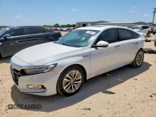 2020 Honda Accord Touring z VIN 1HGCV3F96LA002597, wystawiony jako Copart lot #71090365 z przebiegiem 107 879 mil mil oraz Szkoda całkowita • Salvage title. Historia ofert i sprzedaży dostępna na DreamBid. Obrazek 1.