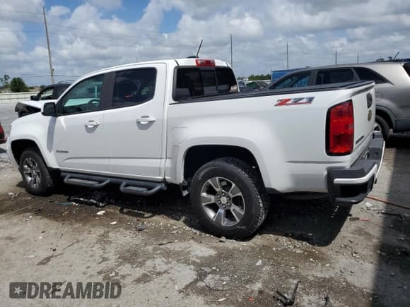 ✅ 2018 Chevrolet Colorado 2WD Z71 • VIN: 1GCGSDEN8J1206666 • Лот: 52737565. Опубликован ранее на Copart с пробегом 60 309 миль. Бесплатный доступ к архиву аукционных продаж из США и подробный отчёт об истории автомобиля на DreamBid. Изображение 2.