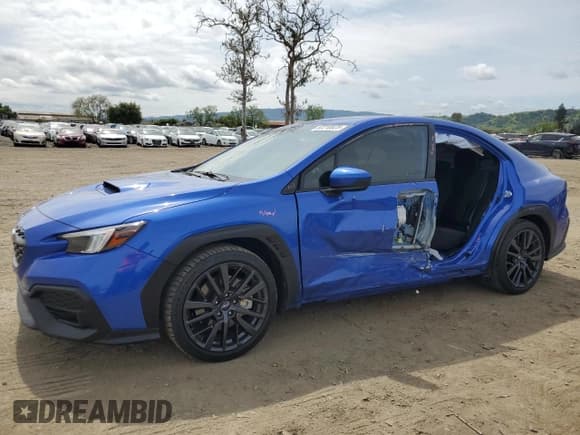 ✅ 2023 Subaru WRX Premium • VIN: JF1VBAF65P9824749 • Lot: 52210825. Wystawiony na Copart z przebiegiem 4 965 mil. Bezpłatny archiwum sprzedaży aukcyjnych z USA i szczegółowy raport historii pojazdu na DreamBid. Zdjęcie 1.