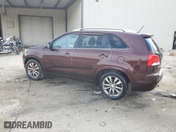 ✅ 2013 Kia Sorento SX • VIN: 5XYKW4A25DG394772 • Lot: 54494345. Listed on Copart with 207,092 mi. Free auction sales archive from the USA and detailed vehicle history report at DreamBid. Image 2.