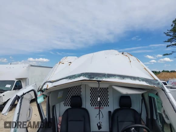 ✅ 2022 Ford Transit Cargo • VIN: 1FTBR3X81NKA63860 • Lot: 42323904. Listed on IAAI with 94,473 mi. Free auction sales archive from the USA and detailed vehicle history report at DreamBid. Image 16.