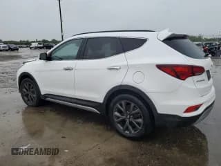 ✅ 2018 Hyundai Santa Fe Ultimate • VIN: 5XYZW4LAXJG571170 • Лот: 58416164. Опубликован ранее на Copart с пробегом 55 088 миль. Бесплатный доступ к архиву аукционных продаж из США и подробный отчёт об истории автомобиля на DreamBid. Изображение 2.
