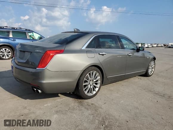✅ 2016 Cadillac CT6 Luxury RWD • VIN: 1G6KC5RX1GU158835 • Lot: 67373604. Listed on Copart with 165,614 mi. Free auction sales archive from the USA and detailed vehicle history report at DreamBid. Image 3.
