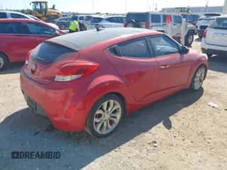 2012 Hyundai Veloster w/Gray Int with VIN KMHTC6AD1CU051606, listed as a IAAI auction lot 43436964 with 144,149 mi miles and . Bid and sale history available at DreamBid. Image 4.