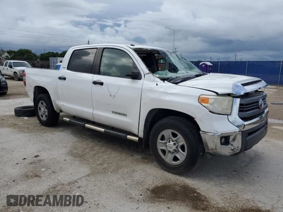 ✅ 2015 Toyota Tundra SR5 • VIN: 5TFDM5F15FX061220 • Lot: 65174795. Listed on Copart with 122,936 mi. Free auction sales archive from the USA and detailed vehicle history report at DreamBid. Image 4.